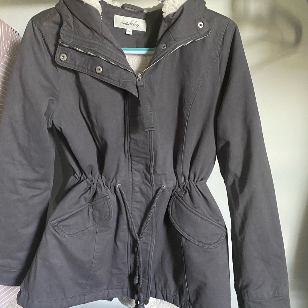 Coat, lined, zipper and buttons with hood.